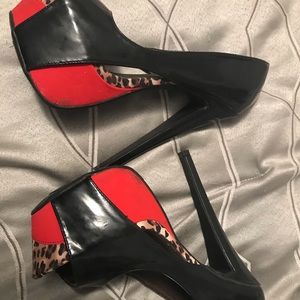 Black cheetah open toe pumps